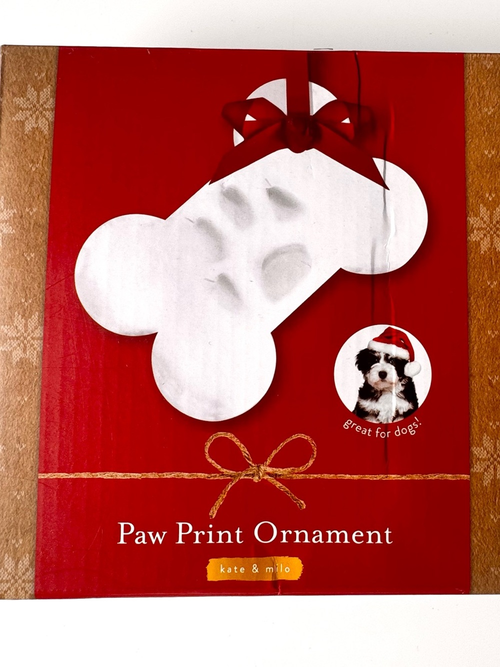 ♥️ Kate & Milo Paw Print Ornament - White Bone Design on Red